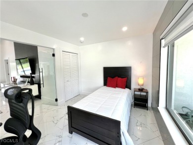 Modern Elegance Meets Florida Living in Imperial Golf Estates! on Imperial Golf Club in Florida - for sale on GolfHomes.com, golf home, golf lot