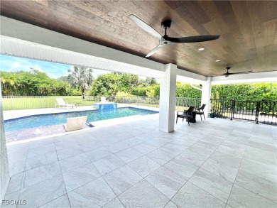 Modern Elegance Meets Florida Living in Imperial Golf Estates! on Imperial Golf Club in Florida - for sale on GolfHomes.com, golf home, golf lot