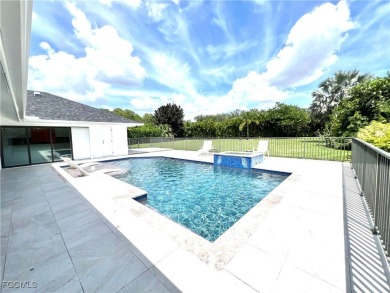 Modern Elegance Meets Florida Living in Imperial Golf Estates! on Imperial Golf Club in Florida - for sale on GolfHomes.com, golf home, golf lot