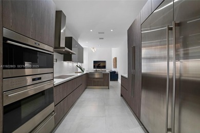 Live the ultimate country club lifestyle in Coral Gables within on Deering Bay Yacht and Country Club in Florida - for sale on GolfHomes.com, golf home, golf lot