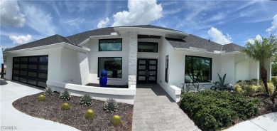 Modern Elegance Meets Florida Living in Imperial Golf Estates! on Imperial Golf Club in Florida - for sale on GolfHomes.com, golf home, golf lot