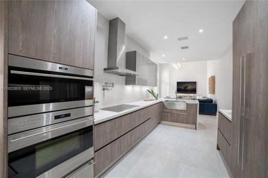 Live the ultimate country club lifestyle in Coral Gables within on Deering Bay Yacht and Country Club in Florida - for sale on GolfHomes.com, golf home, golf lot