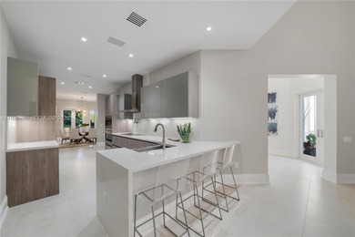 Live the ultimate country club lifestyle in Coral Gables within on Deering Bay Yacht and Country Club in Florida - for sale on GolfHomes.com, golf home, golf lot