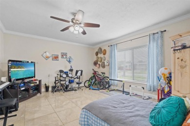 Welcome to your waterfront oasis in Sunrise Golf Village! This on Sunrise Lakes Phase III in Florida - for sale on GolfHomes.com, golf home, golf lot