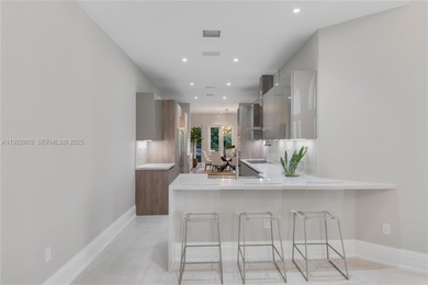 Live the ultimate country club lifestyle in Coral Gables within on Deering Bay Yacht and Country Club in Florida - for sale on GolfHomes.com, golf home, golf lot