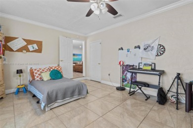Welcome to your waterfront oasis in Sunrise Golf Village! This on Sunrise Lakes Phase III in Florida - for sale on GolfHomes.com, golf home, golf lot