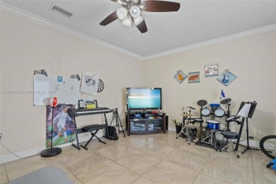 Welcome to your waterfront oasis in Sunrise Golf Village! This on Sunrise Lakes Phase III in Florida - for sale on GolfHomes.com, golf home, golf lot