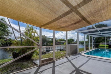 Welcome to your waterfront oasis in Sunrise Golf Village! This on Sunrise Lakes Phase III in Florida - for sale on GolfHomes.com, golf home, golf lot