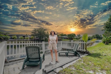 Welcome to your waterfront oasis in Sunrise Golf Village! This on Sunrise Lakes Phase III in Florida - for sale on GolfHomes.com, golf home, golf lot