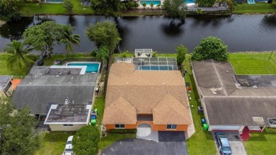 Welcome to your waterfront oasis in Sunrise Golf Village! This on Sunrise Lakes Phase III in Florida - for sale on GolfHomes.com, golf home, golf lot