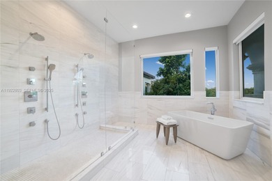 Live the ultimate country club lifestyle in Coral Gables within on Deering Bay Yacht and Country Club in Florida - for sale on GolfHomes.com, golf home, golf lot