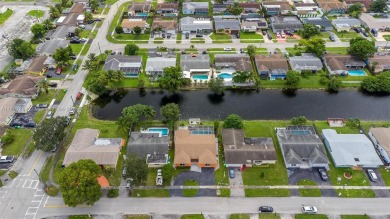Welcome to your waterfront oasis in Sunrise Golf Village! This on Sunrise Lakes Phase III in Florida - for sale on GolfHomes.com, golf home, golf lot