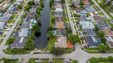 Welcome to your waterfront oasis in Sunrise Golf Village! This on Sunrise Lakes Phase III in Florida - for sale on GolfHomes.com, golf home, golf lot