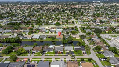 Welcome to your waterfront oasis in Sunrise Golf Village! This on Sunrise Lakes Phase III in Florida - for sale on GolfHomes.com, golf home, golf lot