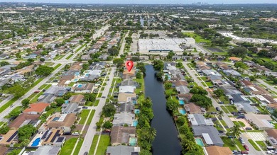 Welcome to your waterfront oasis in Sunrise Golf Village! This on Sunrise Lakes Phase III in Florida - for sale on GolfHomes.com, golf home, golf lot