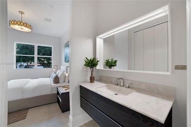 Live the ultimate country club lifestyle in Coral Gables within on Deering Bay Yacht and Country Club in Florida - for sale on GolfHomes.com, golf home, golf lot