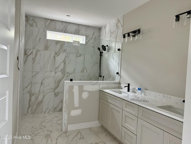 SPECIAL YEAR END SAVINGS from the builder - new price!! Welcome on Magnolia Greens Golf Plantation in North Carolina - for sale on GolfHomes.com, golf home, golf lot