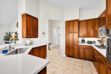 Discover relaxed resort-style living in this beautifully on Oasis Country Club in California - for sale on GolfHomes.com, golf home, golf lot