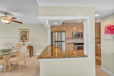 Excellent opportunity to live in the beautiful Palms Tower. This on Deer Creek Golf Club in Florida - for sale on GolfHomes.com, golf home, golf lot