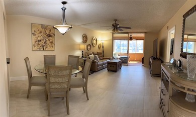 Welcome to this beautifully updated 2-bedroom, 2-bath condo in a on Oriole Golf and Tennis Club in Florida - for sale on GolfHomes.com, golf home, golf lot