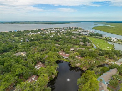 Highly sought-after end unit 2 story townhome overlooking scenic on The Plantation Course At Edisto in South Carolina - for sale on GolfHomes.com, golf home, golf lot