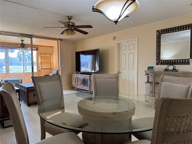 Welcome to this beautifully updated 2-bedroom, 2-bath condo in a on Oriole Golf and Tennis Club in Florida - for sale on GolfHomes.com, golf home, golf lot