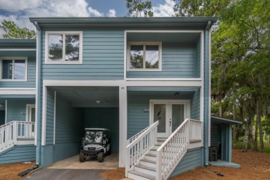 Highly sought-after end unit 2 story townhome overlooking scenic on The Plantation Course At Edisto in South Carolina - for sale on GolfHomes.com, golf home, golf lot