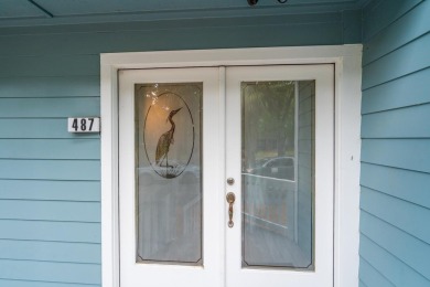 Highly sought-after end unit 2 story townhome overlooking scenic on The Plantation Course At Edisto in South Carolina - for sale on GolfHomes.com, golf home, golf lot