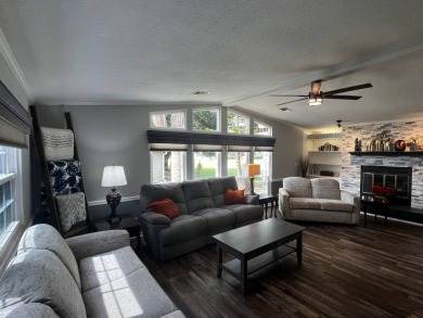 This beautifully updated 2-bedroom, 2-bathroom unfurnished home on Lake Henry Golf Club in Florida - for sale on GolfHomes.com, golf home, golf lot
