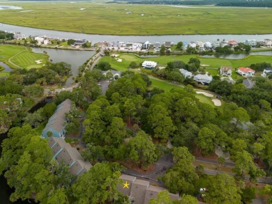 Highly sought-after end unit 2 story townhome overlooking scenic on The Plantation Course At Edisto in South Carolina - for sale on GolfHomes.com, golf home, golf lot