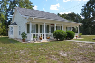 NEW ROOF August 2023 ~ Welcome to this beautifully maintained on The Founders Club At Pawleys Island in South Carolina - for sale on GolfHomes.com, golf home, golf lot
