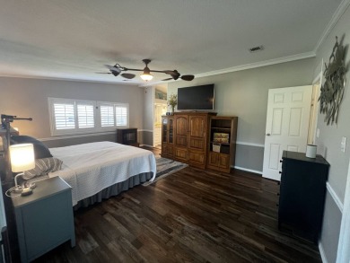 This beautifully updated 2-bedroom, 2-bathroom unfurnished home on Lake Henry Golf Club in Florida - for sale on GolfHomes.com, golf home, golf lot