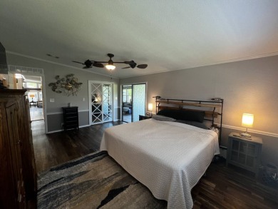 This beautifully updated 2-bedroom, 2-bathroom unfurnished home on Lake Henry Golf Club in Florida - for sale on GolfHomes.com, golf home, golf lot