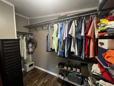 This beautifully updated 2-bedroom, 2-bathroom unfurnished home on Lake Henry Golf Club in Florida - for sale on GolfHomes.com, golf home, golf lot