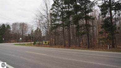 Corner parcel on state highway M-115 across from Crystal on Crystal Mountain Golf Course in Michigan - for sale on GolfHomes.com, golf home, golf lot