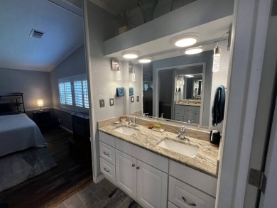 This beautifully updated 2-bedroom, 2-bathroom unfurnished home on Lake Henry Golf Club in Florida - for sale on GolfHomes.com, golf home, golf lot