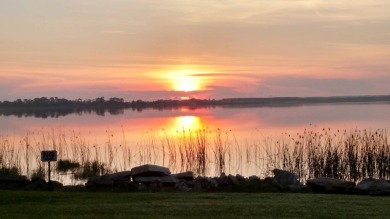 This beautifully updated 2-bedroom, 2-bathroom unfurnished home on Lake Henry Golf Club in Florida - for sale on GolfHomes.com, golf home, golf lot