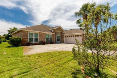 One-of-a-kind, renovated modern look home on the water in highly on Indian Bayou Golf and Country Club in Florida - for sale on GolfHomes.com, golf home, golf lot