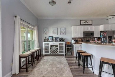 One-of-a-kind, renovated modern look home on the water in highly on Indian Bayou Golf and Country Club in Florida - for sale on GolfHomes.com, golf home, golf lot