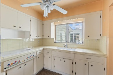 Offered for sale is this incredible 2-bedroom, 2-bathroom, 1 car on Pasadena Yacht and Country Club in Florida - for sale on GolfHomes.com, golf home, golf lot