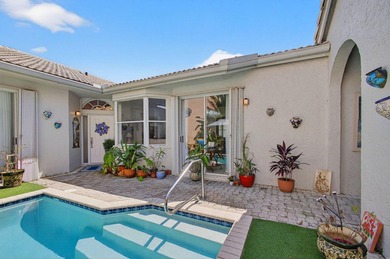 Rarely available single-story courtyard home perfectly situated on Bear Lakes Country Club in Florida - for sale on GolfHomes.com, golf home, golf lot