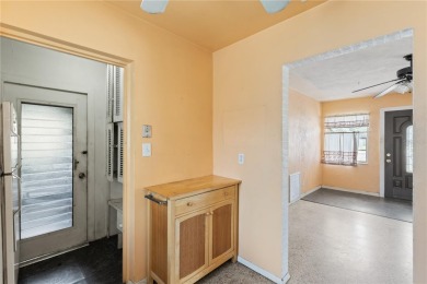 Offered for sale is this incredible 2-bedroom, 2-bathroom, 1 car on Pasadena Yacht and Country Club in Florida - for sale on GolfHomes.com, golf home, golf lot