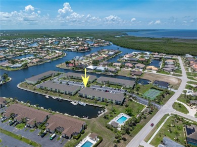 END-UNIT CONDO IN PGI W/UPDATED INTERIOR  DIRECT SAILBOAT ACCESS on Saint Andrews South Golf Club in Florida - for sale on GolfHomes.com, golf home, golf lot