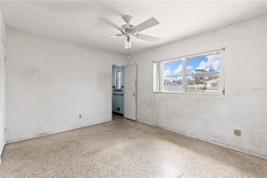 Offered for sale is this incredible 2-bedroom, 2-bathroom, 1 car on Pasadena Yacht and Country Club in Florida - for sale on GolfHomes.com, golf home, golf lot