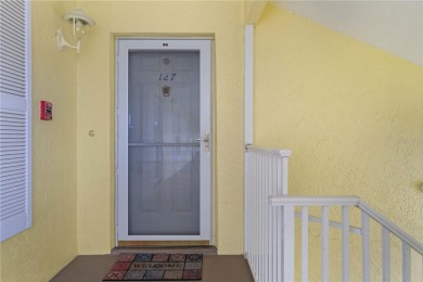 END-UNIT CONDO IN PGI W/UPDATED INTERIOR  DIRECT SAILBOAT ACCESS on Saint Andrews South Golf Club in Florida - for sale on GolfHomes.com, golf home, golf lot
