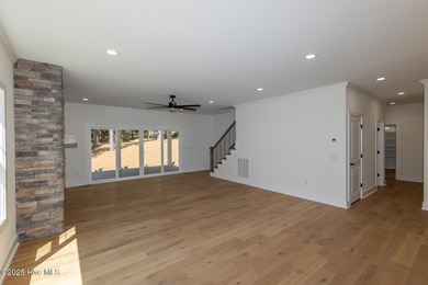 Welcome to your dream home in the premier lake and golf on Beacon Ridge Golf and Country Club in North Carolina - for sale on GolfHomes.com, golf home, golf lot