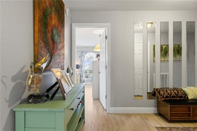 END-UNIT CONDO IN PGI W/UPDATED INTERIOR  DIRECT SAILBOAT ACCESS on Saint Andrews South Golf Club in Florida - for sale on GolfHomes.com, golf home, golf lot