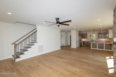 Welcome to your dream home in the premier lake and golf on Beacon Ridge Golf and Country Club in North Carolina - for sale on GolfHomes.com, golf home, golf lot