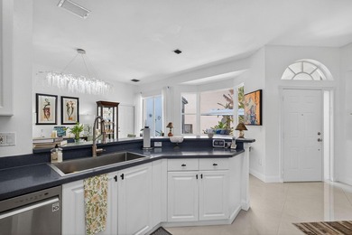 Rarely available single-story courtyard home perfectly situated on Bear Lakes Country Club in Florida - for sale on GolfHomes.com, golf home, golf lot