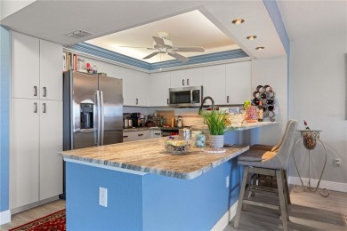 END-UNIT CONDO IN PGI W/UPDATED INTERIOR  DIRECT SAILBOAT ACCESS on Saint Andrews South Golf Club in Florida - for sale on GolfHomes.com, golf home, golf lot